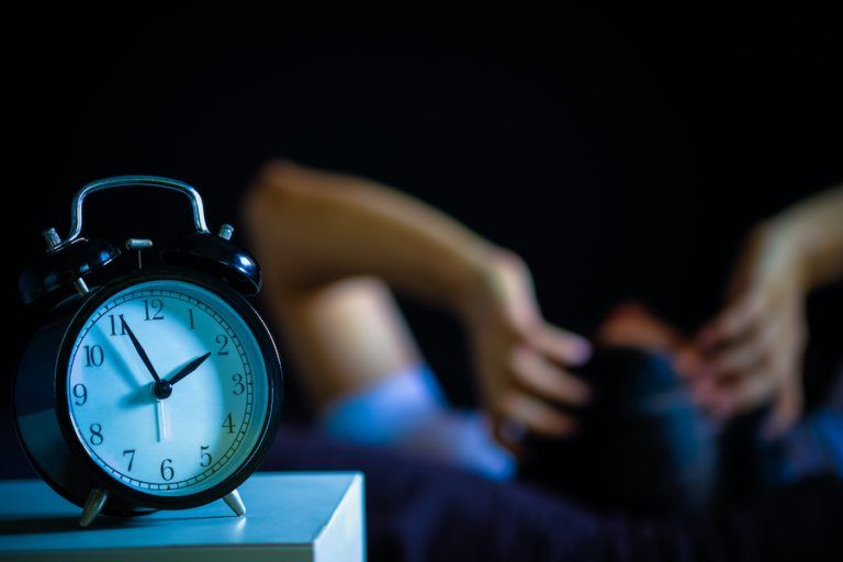 Asian Man In Bed Suffering Insomnia And Sleep Disorder Thinking About His Problem At Night
