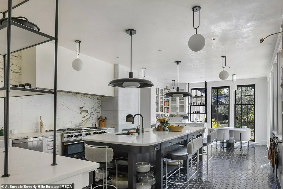 85679675 13491549 The_kitchen_is_every_chef_s_dream_featuring_high_ceilings_floor_ A 3_1717473053180