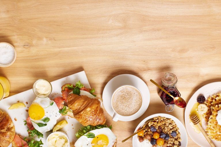 Healthy Sunday Breakfast With Croissants, Waffles, Granola And Sandwiches